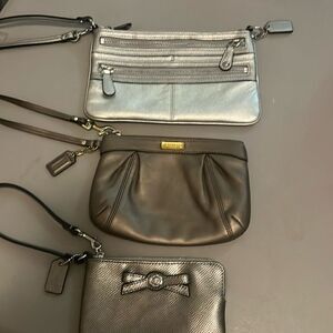 Coach wristlets three in the bundle